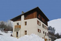 Chalet Andreas en Jacobin interieur - chalet in de sneeuw met houten dak